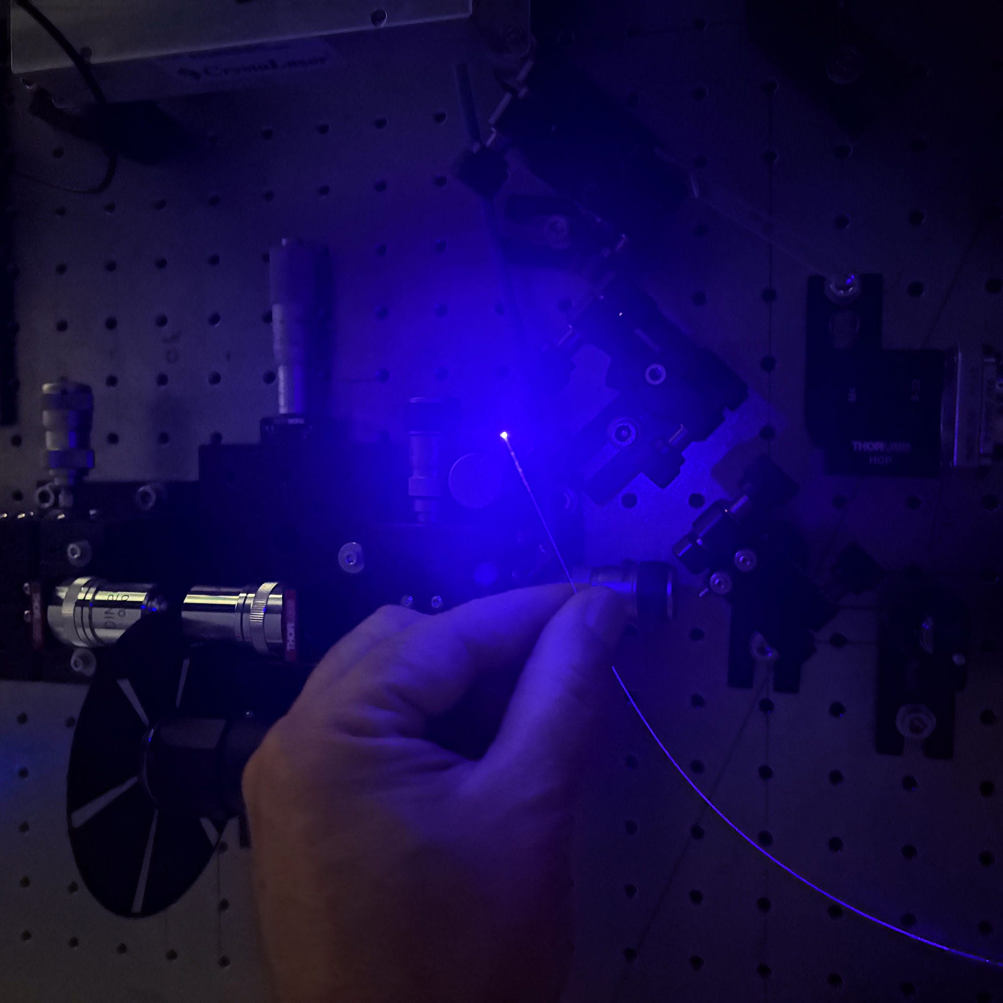 Fibre optic probe being held 