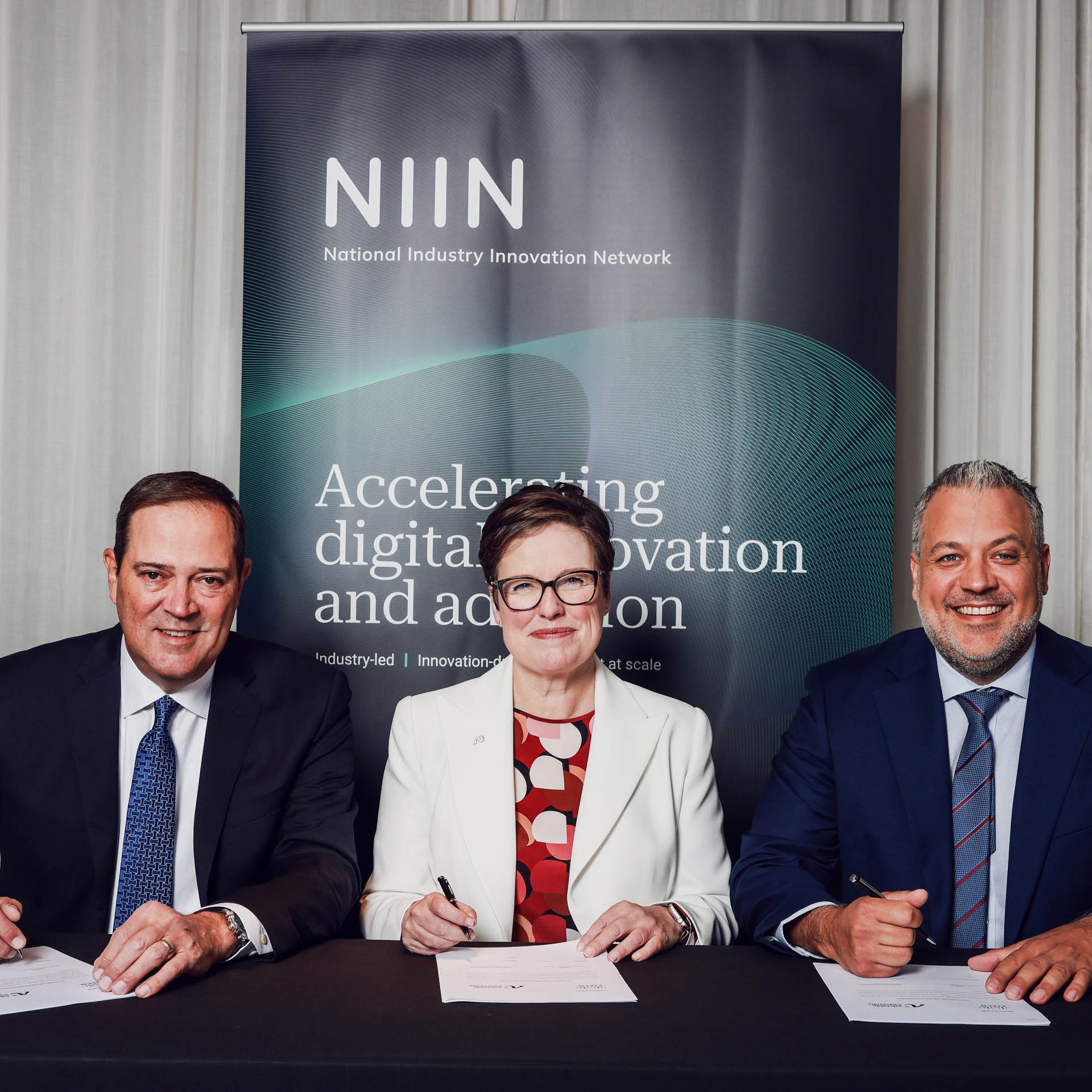 Chuck Robbins, Cisco CEO and Chairman; Adelaide University Vice Chancellor Nicola Phillips; Stefan Leitl, VP Cisco ANZ.